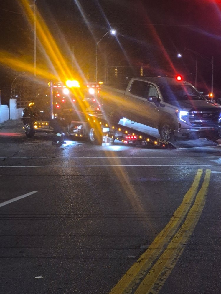 Corvette loaded on flatbed